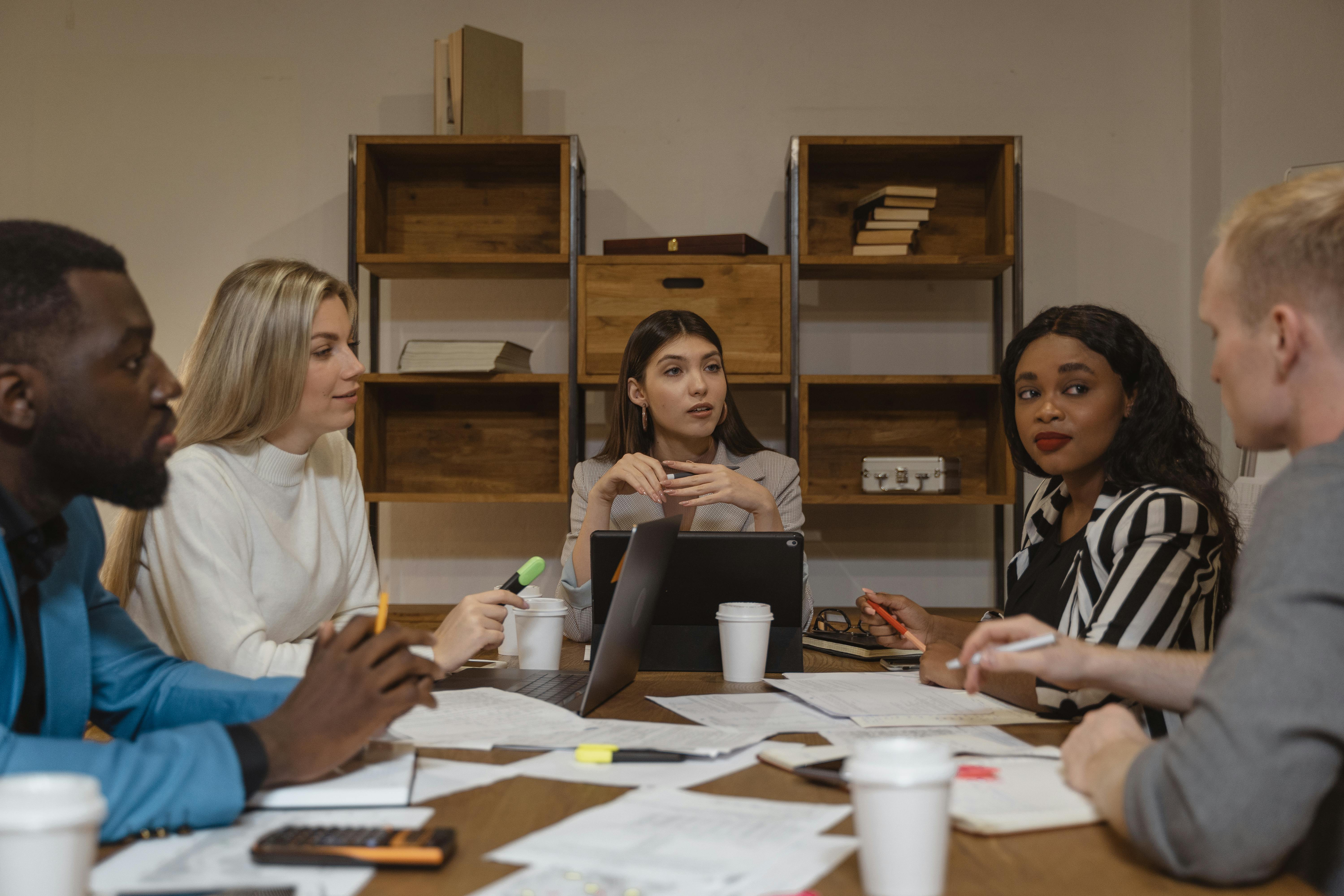 Business professionals in a formal governance and strategy discussion